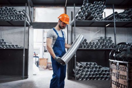 portrait-young-worker-hard-hat-large-metalworking-plant